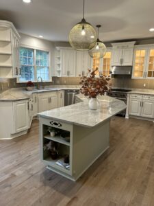 view of kitchen with marble island and countertops